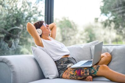 Woman relaxing sitting on a couch